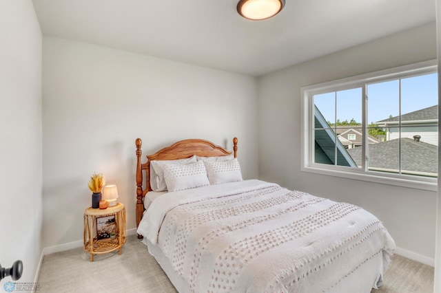 6176 Marigold Loop S, Fargo, ND 58104 - bedroom with light colored carpet and baseboards
