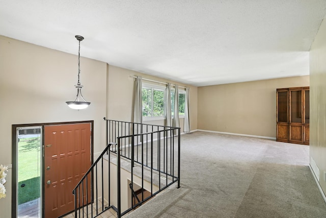 1958 6th St N, North Saint Paul, MN 55109 - carpeted foyer entrance featuring baseboards