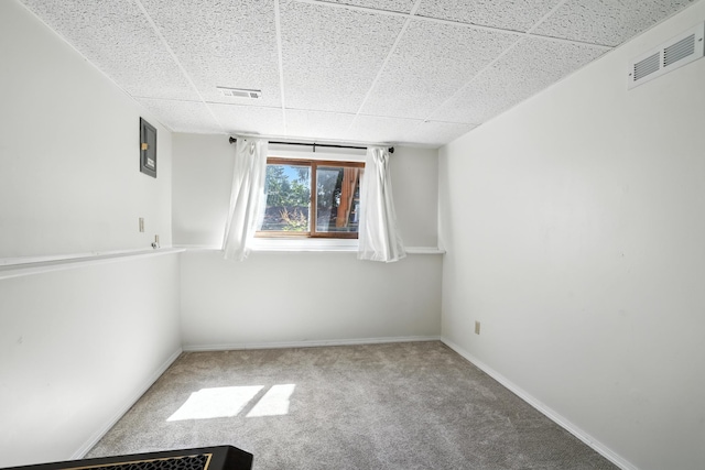 1958 6th St N, North Saint Paul, MN 55109 - unfurnished room featuring a paneled ceiling and carpet flooring
