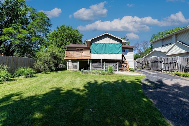 1958 6th St N, North Saint Paul, MN 55109 - view of front of home with stairway, a deck, and board and batten siding