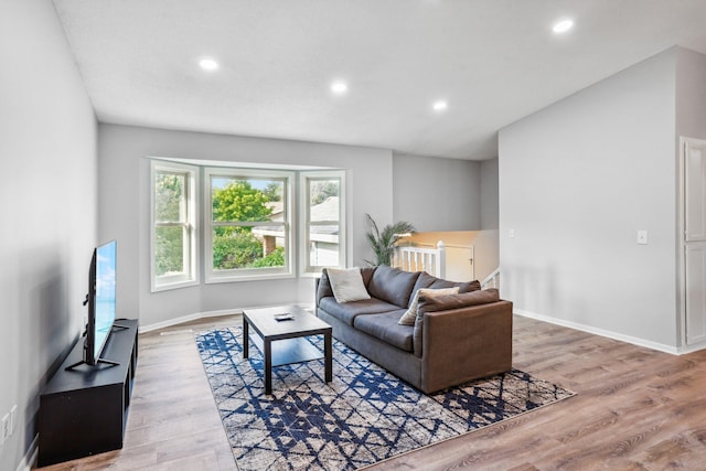 1318 Windcrest Ave, Eagan, MN 55123 - living area with light wood-style floors and recessed lighting