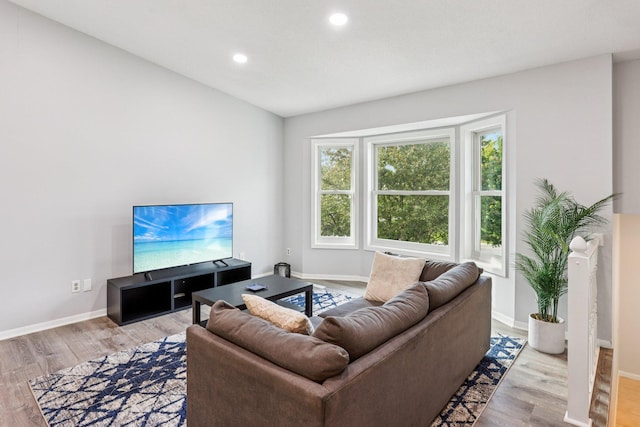 1318 Windcrest Ave, Eagan, MN 55123 - living room with light wood finished floors and recessed lighting