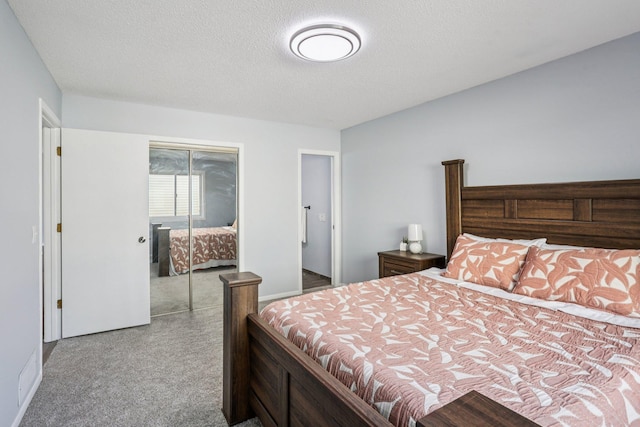 1318 Windcrest Ave, Eagan, MN 55123 - carpeted bedroom featuring a closet and a textured ceiling