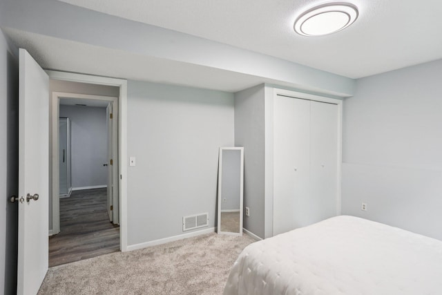 1318 Windcrest Ave, Eagan, MN 55123 - bedroom featuring carpet and a closet