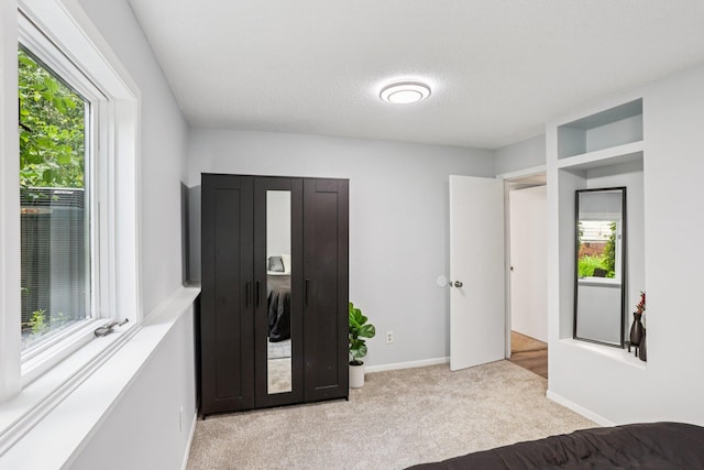 1318 Windcrest Ave, Eagan, MN 55123 - bedroom with light carpet and baseboards