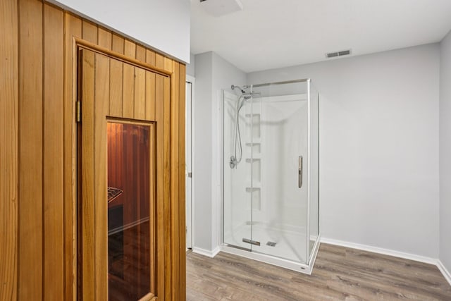 1318 Windcrest Ave, Eagan, MN 55123 - full bath with a shower stall and wood finished floors