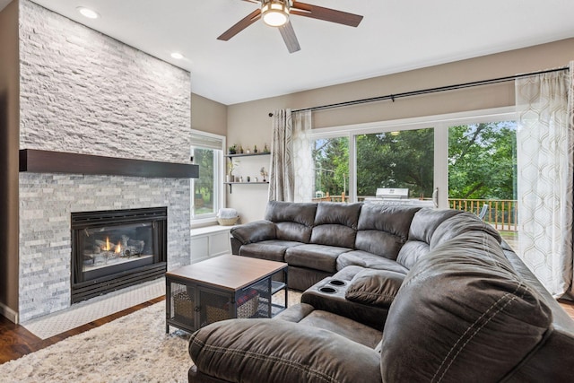 17964 Fresno St NW, Elk River, MN 55330 - living room with ceiling fan, wood finished floors, a fireplace, and recessed lighting