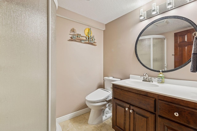 17964 Fresno St NW, Elk River, MN 55330 - full bathroom featuring vanity, a shower stall, a textured ceiling, and tile patterned floors