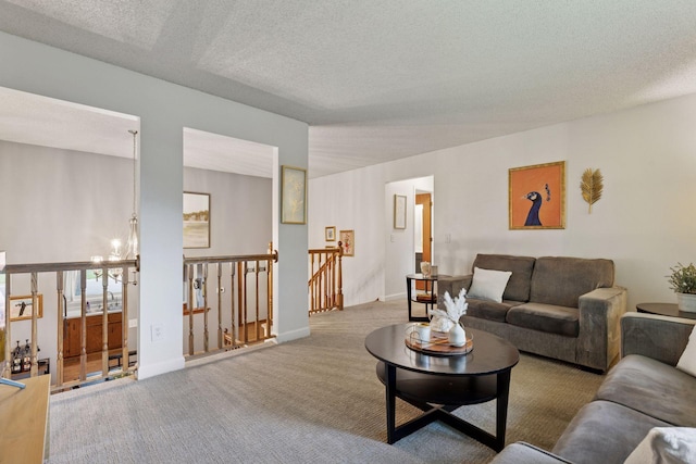 9743 Hemlock Ln N, Maple Grove, MN 55369 - living room featuring a chandelier, carpet flooring, and a textured ceiling
