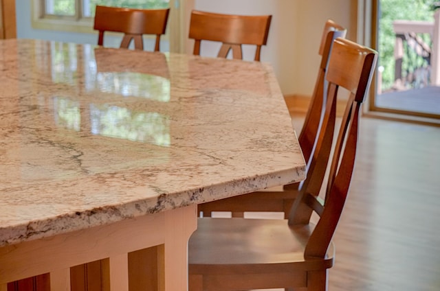 442 Wren Ln, Hudson, WI 54016 - unfurnished dining area featuring wood finished floors