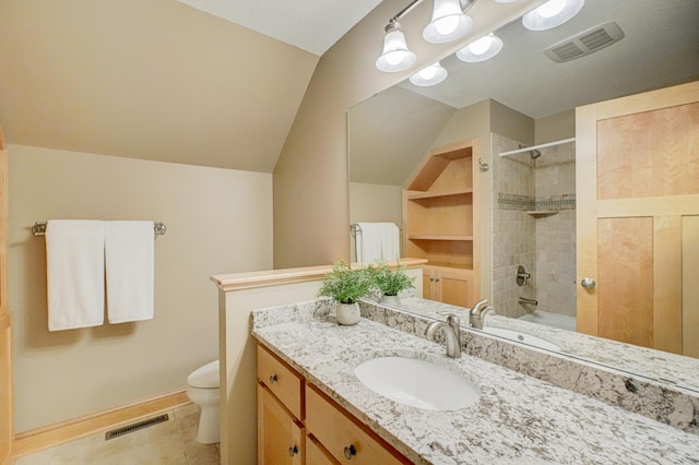 442 Wren Ln, Hudson, WI 54016 - full bath with vanity, vaulted ceiling, shower / bathtub combination, and tile patterned flooring