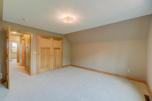 442 Wren Ln, Hudson, WI 54016 - additional living space with light carpet and lofted ceiling