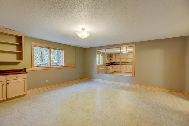 442 Wren Ln, Hudson, WI 54016 - unfurnished room with a textured ceiling