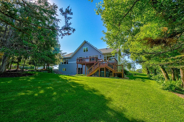 442 Wren Ln, Hudson, WI 54016 - back of house with stairs, a deck, and a lawn