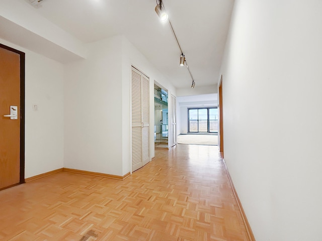 110 1st Ave NE Unit 1006, Minneapolis, MN 55413 - hallway with baseboards and rail lighting