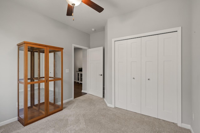 19400 75th Ave, Corcoran, MN 55340 - unfurnished bedroom featuring carpet, a closet, and ceiling fan