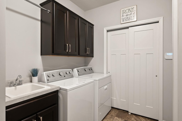 19400 75th Ave, Corcoran, MN 55340 - washroom featuring cabinet space, washing machine and dryer, and stone finish flooring
