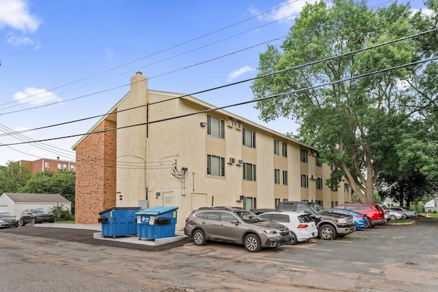3729 Snelling Ave Unit 108, Minneapolis, MN 55406 - view of building exterior featuring uncovered parking