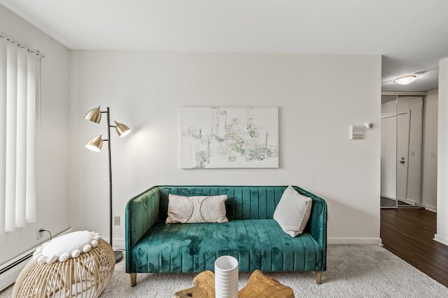 3729 Snelling Ave Unit 108, Minneapolis, MN 55406 - carpeted living room featuring baseboards and a baseboard heating unit