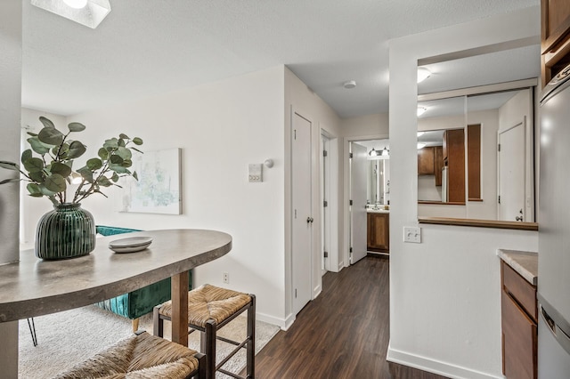 3729 Snelling Ave Unit 108, Minneapolis, MN 55406 - corridor featuring baseboards and dark wood-style floors