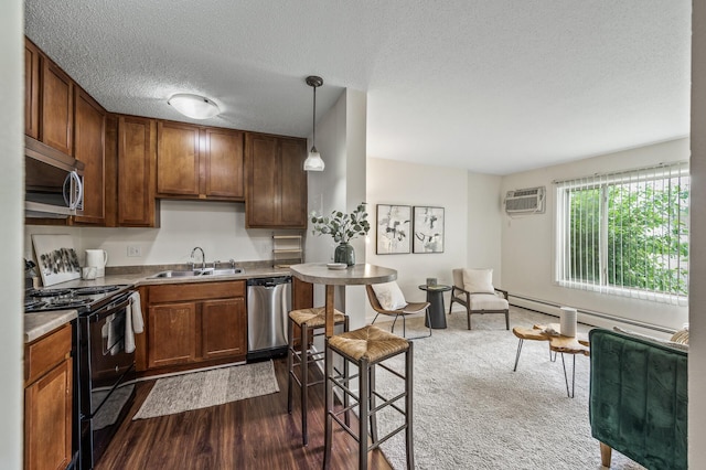 3729 Snelling Ave Unit 108, Minneapolis, MN 55406 - kitchen featuring appliances with stainless steel finishes, a textured ceiling, an AC wall unit, dark wood-style floors, and decorative light fixtures