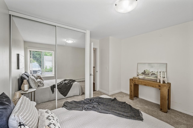 3729 Snelling Ave Unit 108, Minneapolis, MN 55406 - carpeted bedroom with baseboards and a closet