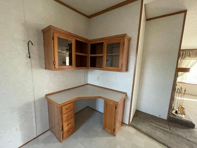 21344 County Road 11, Crosby, MN 56441 - unfurnished office featuring crown molding, light tile patterned floors, and built in study area