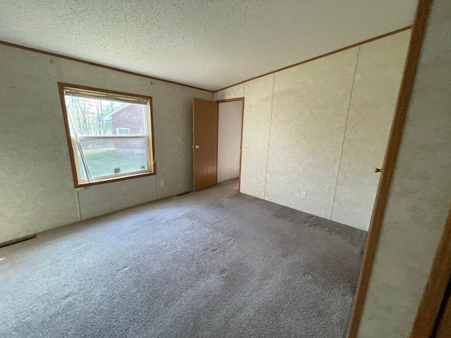 21344 County Road 11, Crosby, MN 56441 - carpeted spare room with a textured ceiling