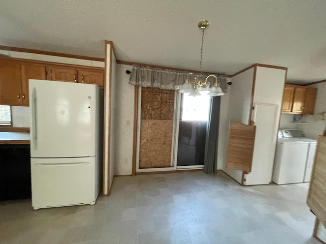 21344 County Road 11, Crosby, MN 56441 - unfurnished dining area with washer / dryer, a chandelier, healthy amount of natural light, and light flooring