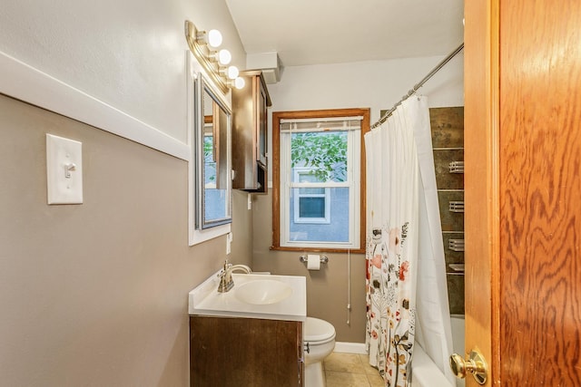 1821 Orange Ave E, Saint Paul, MN 55119 - full bath with vanity, tile patterned flooring, and shower / tub combo