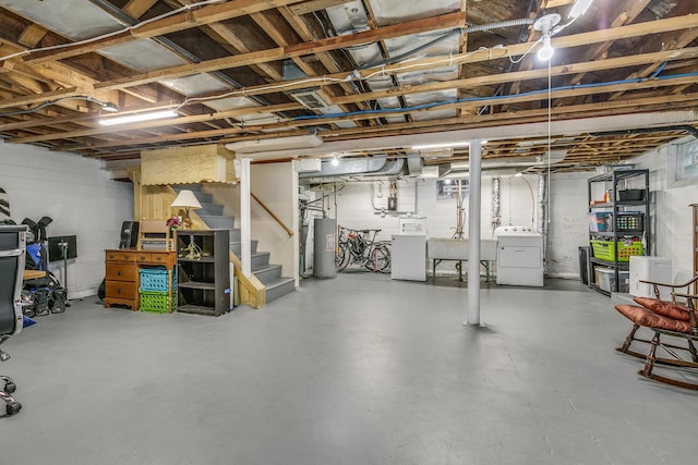 1821 Orange Ave E, Saint Paul, MN 55119 - unfinished basement with washing machine and clothes dryer, water heater, stairway, and concrete block wall