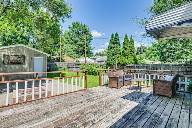 1821 Orange Ave E, Saint Paul, MN 55119 - wooden deck with a fenced backyard and an outbuilding