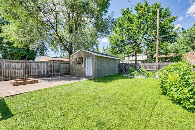 1821 Orange Ave E, Saint Paul, MN 55119 - fenced backyard featuring a garden, a patio, and a shed