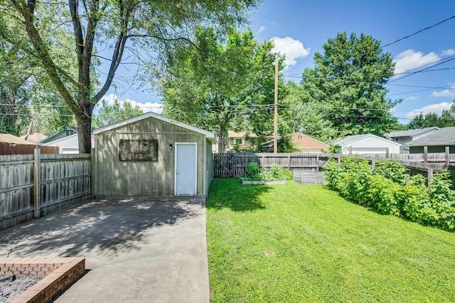 1821 Orange Ave E, Saint Paul, MN 55119 - fenced backyard with a patio area and a storage unit