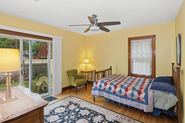 116 9th Ave NW, Rochester, MN 55901 - bedroom featuring access to outside and wood finished floors