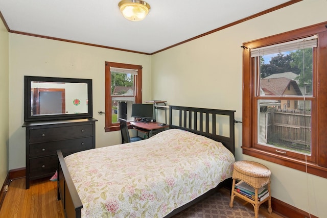 116 9th Ave NW, Rochester, MN 55901 - bedroom with wood finished floors and ornamental molding