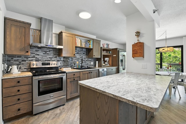 6615 Lake Shore Dr S Unit 317, Richfield, MN 55423 - kitchen with stainless steel appliances, wall chimney exhaust hood, a textured ceiling, light wood-type flooring, and open shelves