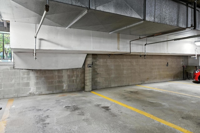 6615 Lake Shore Dr S Unit 317, Richfield, MN 55423 - parking deck featuring concrete block wall