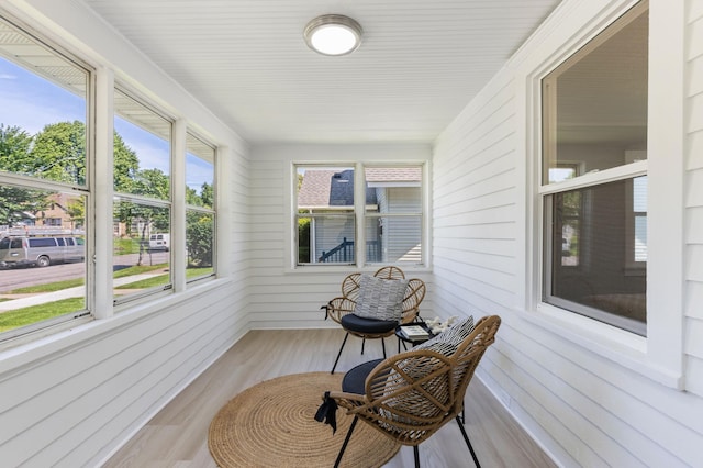 1634 Upton Ave N, Minneapolis, MN 55411 - sunroom / solarium featuring wood finished floors and wooden walls