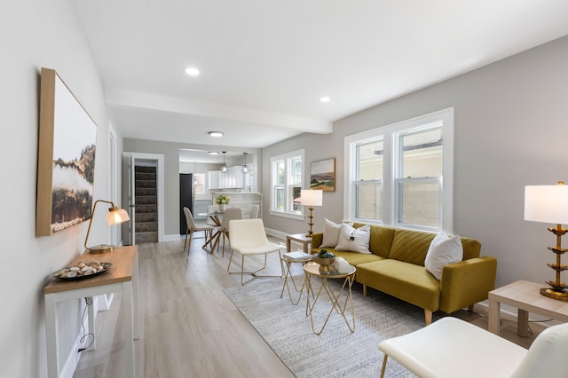 1634 Upton Ave N, Minneapolis, MN 55411 - living room with light wood-style flooring, recessed lighting, and beamed ceiling