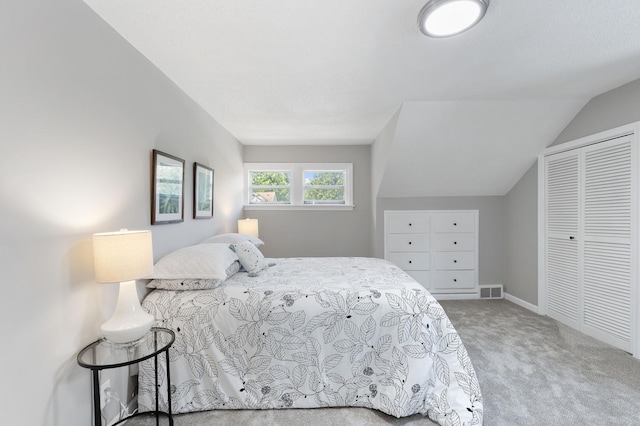 1634 Upton Ave N, Minneapolis, MN 55411 - carpeted bedroom with a closet and lofted ceiling
