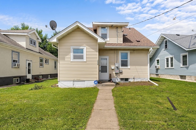 1634 Upton Ave N, Minneapolis, MN 55411 - view of front of home with a front yard and a shingled roof