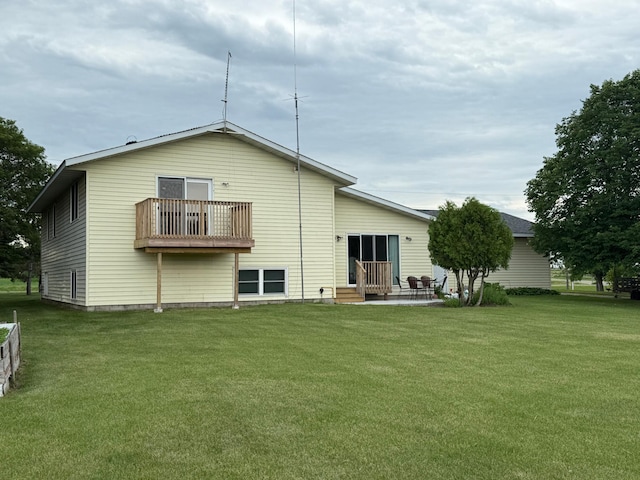 31044 Acorn Lake Rd, Frazee, MN 56544 - back of property with a patio, a lawn, and a balcony