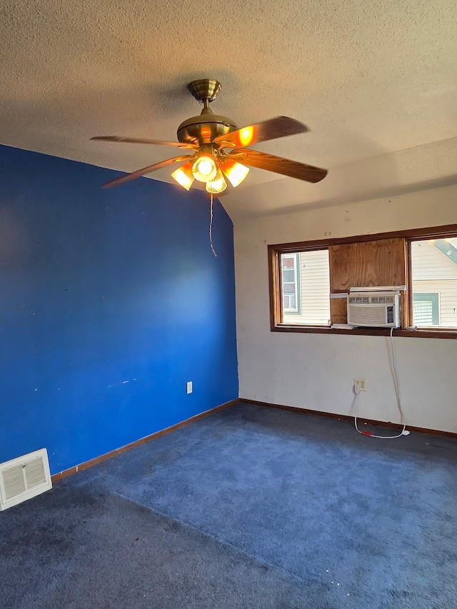 658 Bellows St, Saint Paul, MN 55107 - unfurnished living room with cooling unit, a textured ceiling, a ceiling fan, and carpet floors