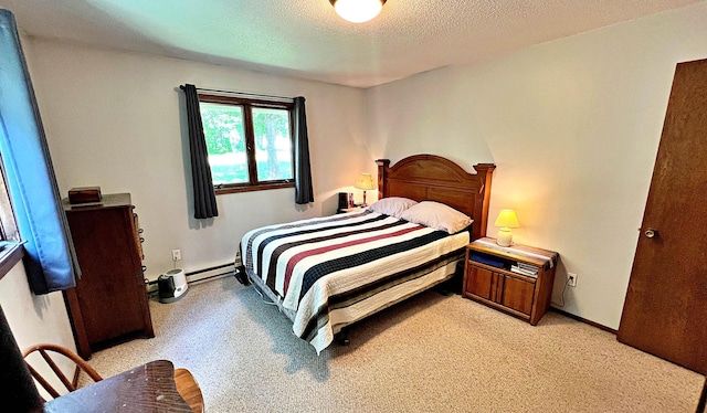 39631 342nd Ln, Aitkin, MN 56431 - bedroom with light carpet, a textured ceiling, and baseboard heating