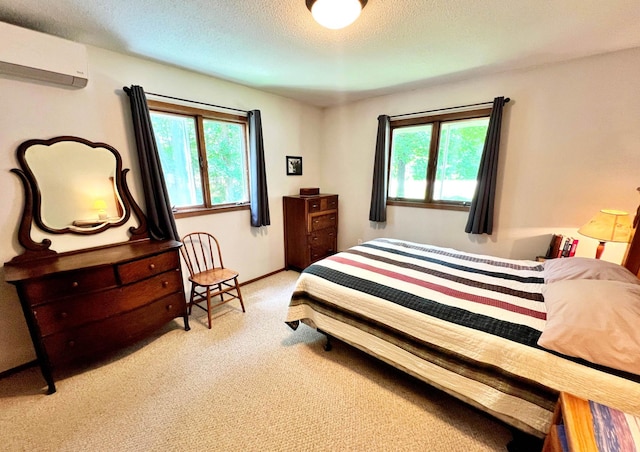 39631 342nd Ln, Aitkin, MN 56431 - carpeted bedroom with a wall unit AC, multiple windows, and a textured ceiling