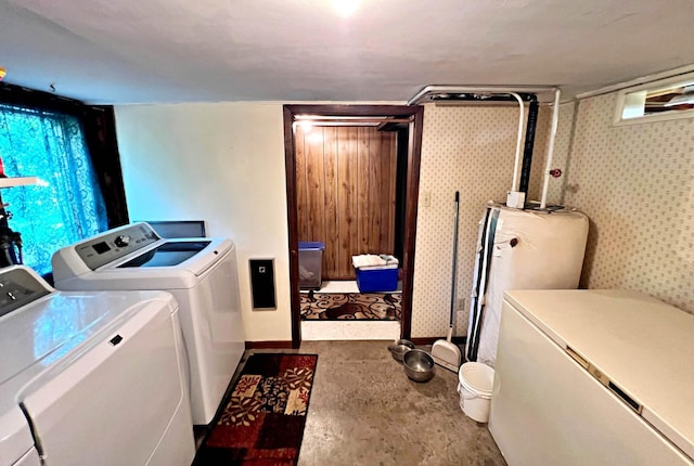 39631 342nd Ln, Aitkin, MN 56431 - washroom featuring washing machine and clothes dryer and wallpapered walls