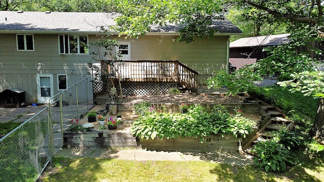 39631 342nd Ln, Aitkin, MN 56431 - back of house with a wooden deck, roof with shingles, and stairs