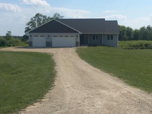 1267 146th Ave, New Richmond, WI 54017 - ranch-style home with driveway, a front yard, and an attached garage