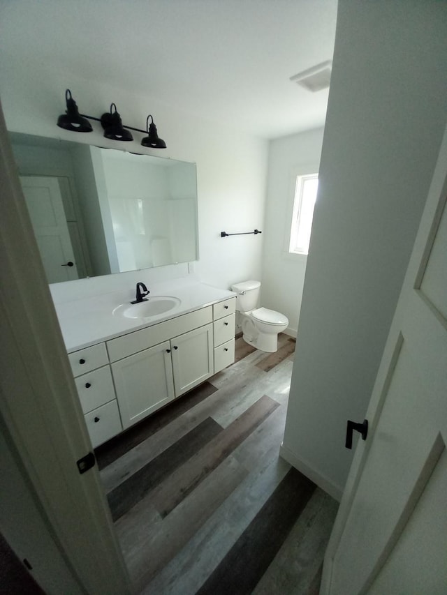 1267 146th Ave, New Richmond, WI 54017 - bathroom with wood finished floors and vanity